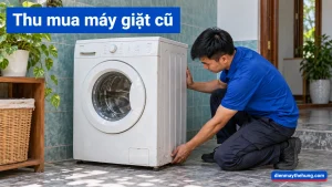 Nhân viên xem ngoại hình máy giặt cũ trong nhà Việt Nam